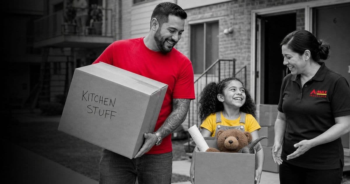 A father and daughter carrying moving boxes while talking with an A-MAX agent
